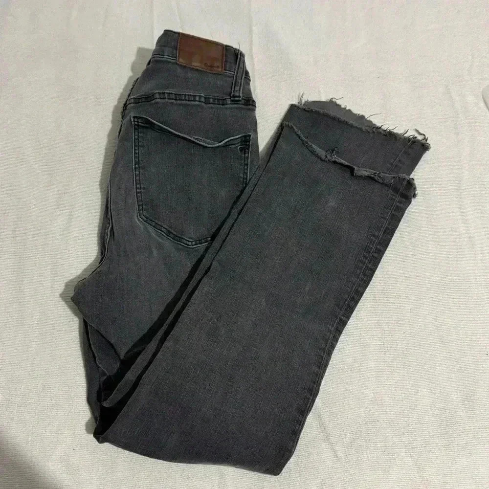 Madewell Cali Demi Boot Black Jeans. Fringed bottoms. 4 Button Fly.